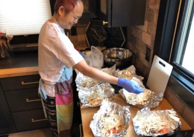 Koichi preparing meals